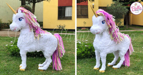 Unicornio cascos dorados